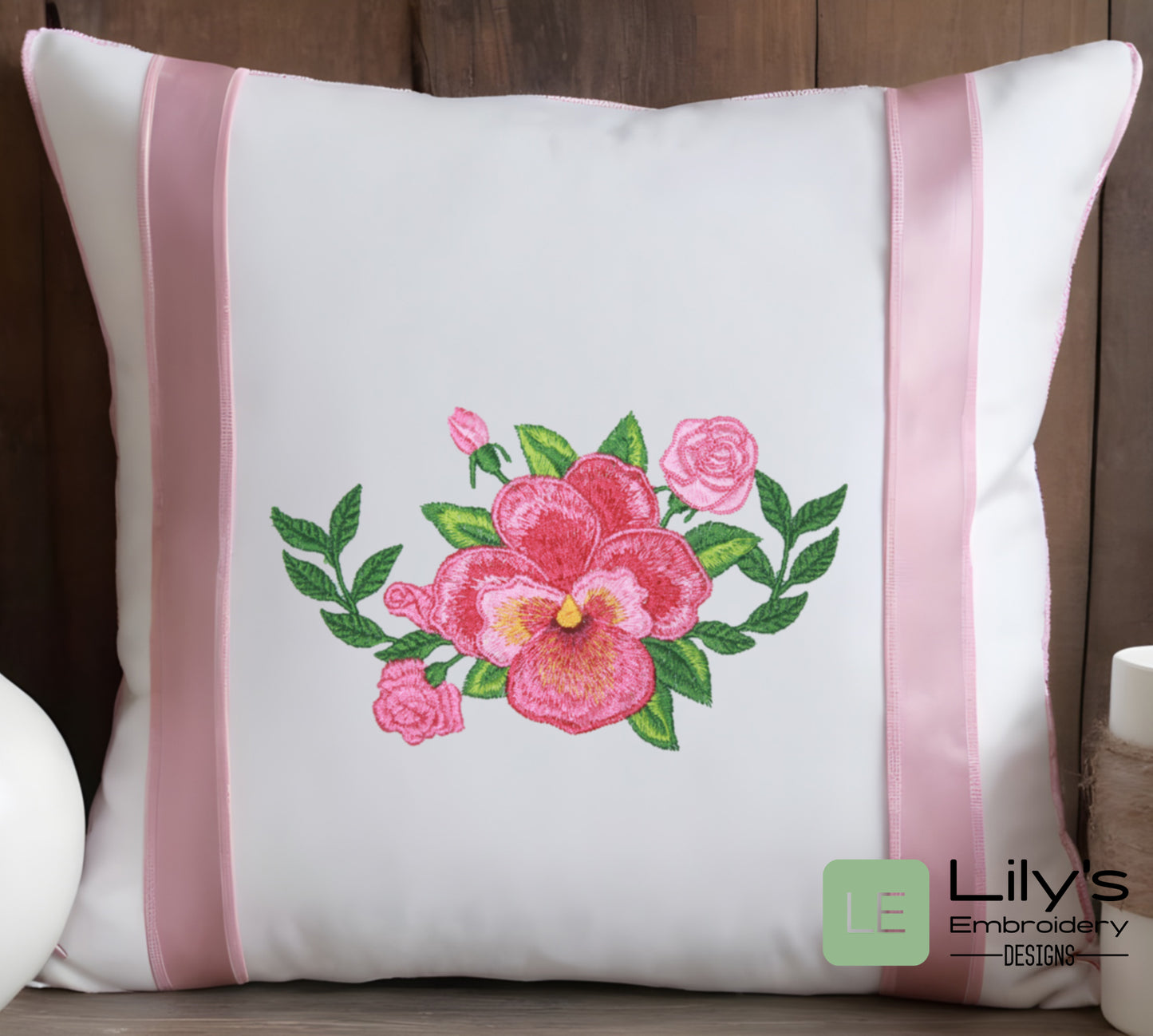 Pansy Machine Embroidery design embroidered on a pillow