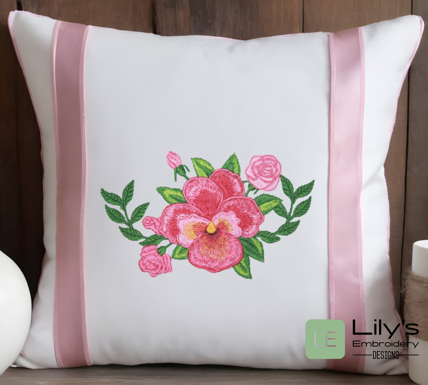 Pansy Machine Embroidery design  embroidered on a pillow